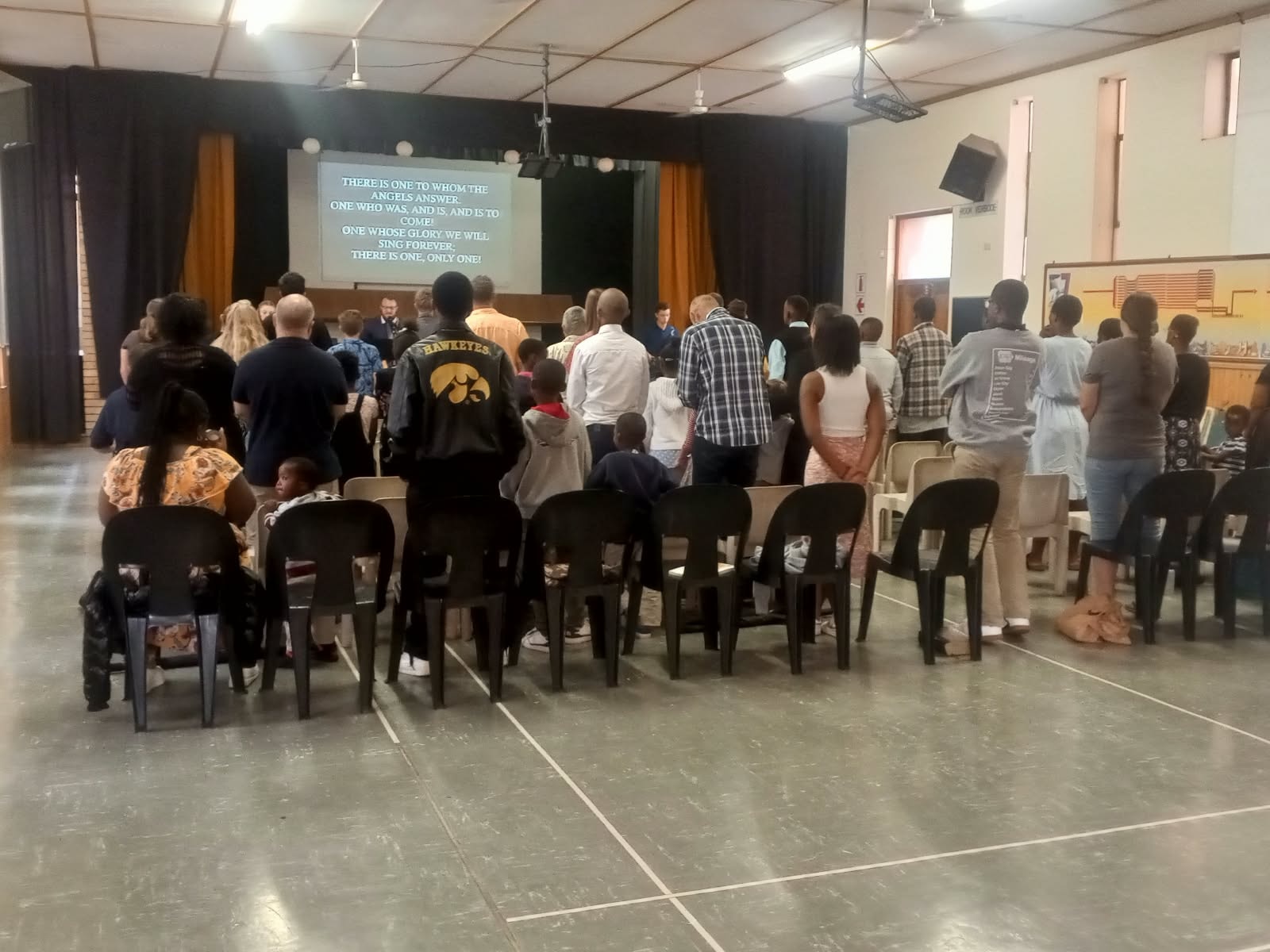 Men gathered in community at Sand River Recovery Centre